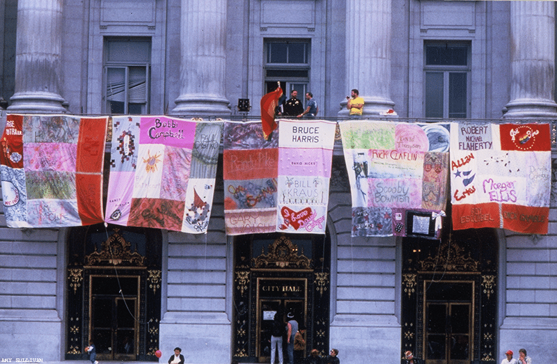 The AIDS Memorial Quilt on display from San Francisco’s city hall in 1987  Credit: HIV Plus Magazine