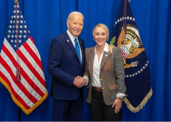 Photo of President Biden and CEO Anna Laymon