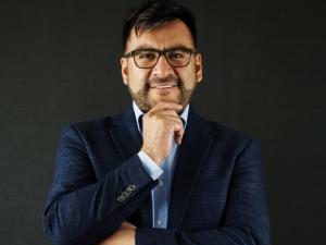Headshot photo of Dr. Manuel Cuellar