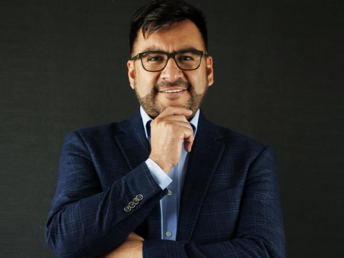 Headshot photo of Dr. Manuel Cuellar