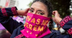 Image Caption: A woman participates in a march against gender violence in Quito, Ecuador  Credit: UN Women/Johis Alarcón